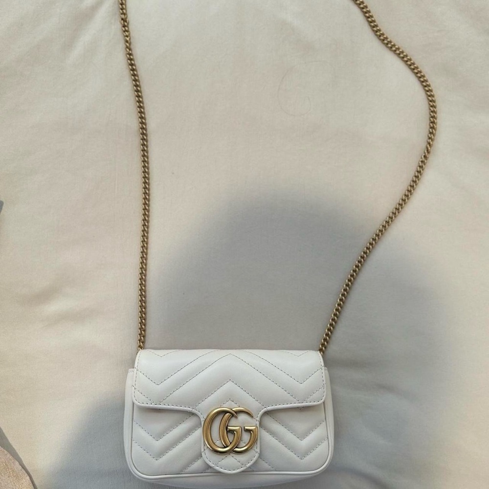 The GG Marmont Super Mini Bag in white matelassé leather